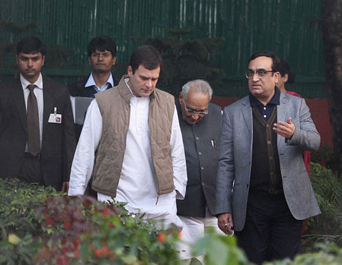 Congress Vice President Rahul Gandhi with party leaders Motilal Vohra and Ajay Maken arrives for a meeting with Screening Committee of the party at AICC headquarters in New Delhi. PTI Image