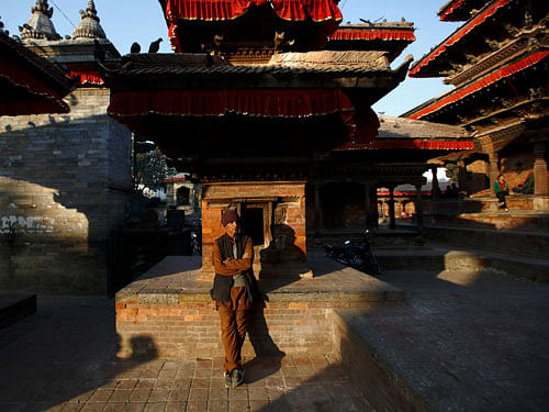 A man sits near a temple at the premises of Hanumandhoka Durbar Square in Kathmandu / Reuters file image for representation only