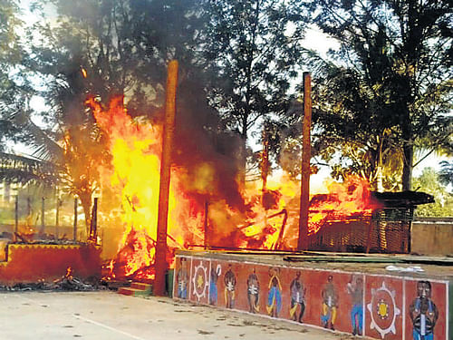 Vandalised to the core: A mob went on a rampage, setting afire computers and electronic equipment at the Green Grove International School in  Sampigehalli on Wednesday, a day after a fatal accident involving the school van. dh Photos