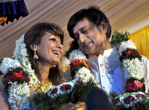 Union Minister Shashi Tharoor and his wife Sunanda Pushkar Thursday issued a joint statement saying they are distressed by an ''unseemly controversy'' over some ''unauthorised tweets'' posted from their Twitter accounts and that both are ''happily married and intend to remain that way''. PTI file photo