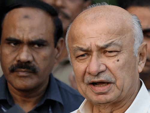 The war between former home secretary R K Singh and Home Minister Sushilkumar Shinde (in photo) escalated on Thursday with the Union Home Ministry withdrawing around 10 officers, including security personnel, given to the retired bureaucrat. PTI File Photo.