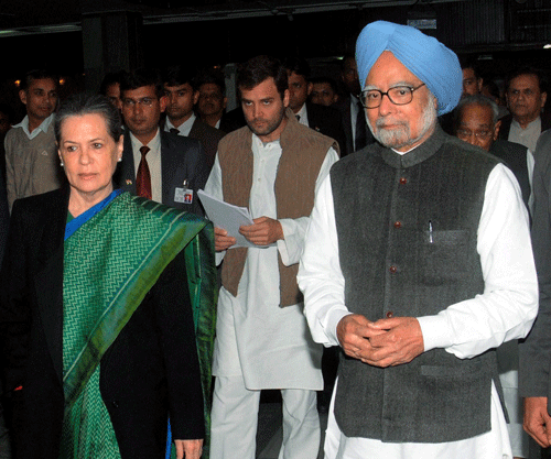 Congress president Sonia Gandhi, Prime Minister Manmohan Singh and party vice-president Rahul Gandhi arrive for a meeting of the Extended Congress Working Committee in New Delhi on Thursday. PTI