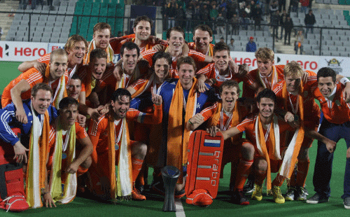 Winners Netherlands with the Hero Hockey World League trophy after they beat New Zealand in the finals in New Delhi on Saturday. PTI Photo