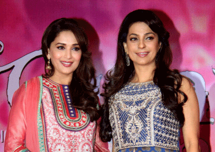 Bollywood actress Madhuri Dixit with Juhi Chawla during a promotional event of her upcoming movie Gulaab Gang in Mumbai. PTI Photo