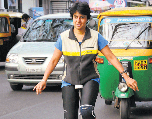 yes she can: Priya Khokhale rides her unicycle in the City. dh photo