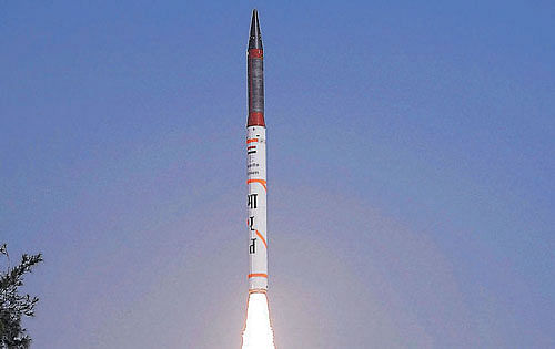 Agni IV zooms into space after the launch at Wheeler Island off the coast of Odisha on Monday. PTI