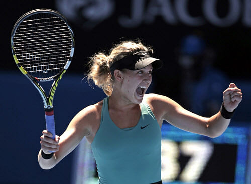 Eugenie Bouchard of Canada celebrates after defeating Ana Ivanovic of Serbia during their quarterfinal at the Australian Open tennis championship in Melbourne, Australia, Tuesday, Jan. 21, 2014. (AP Photo)