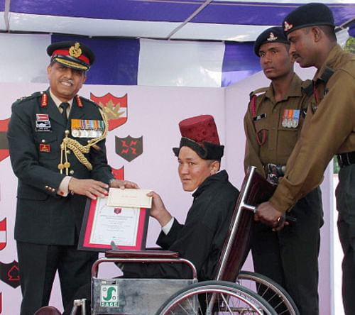 For the first time, three civilians from Ladakh region, including a porter in Siachin who saved two soldiers buried in an avalanche, have been honoured by Army with special award for their exemplary courage and devotion to duty. PTI Photo