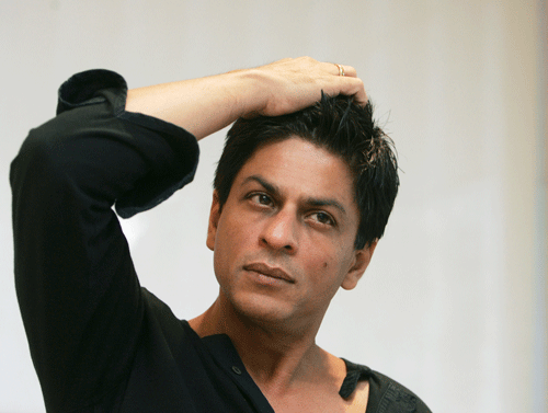 Khan's office said the Bollywood superstar has suffered a minor injury while shooting a new movie. He was shooting for director Farah Khan's new film at a luxury hotel in Mumbai when a door fell on him. (AP Photo)