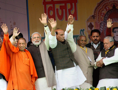 BJP Prime Ministerial candidate Narendra Modi with party President Rajnath Singh, Kalyan Singh and MPs Yogi Adityanath and Kalraj Mishra waves at crowd during a rally at Gorakhpur in Uttar Pradesh on Thursday. PTI Photo