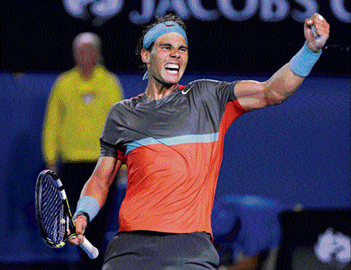 roar of a winner: Rafael Nadal celebrates his win over Roger Federer in the Australian Open semifinals in Melbourne on Friday. AP