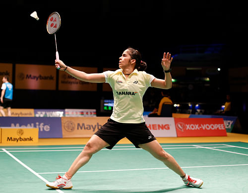 Top Indian shuttler Saina Nehwal beat compatriot and second seed P.V. Sindhu in straight games to take the women's singles crown of the $120,000 India Grand Prix Gold at the Babu Banarasi Das Indoor Stadium here Sunday. AP File Photo.