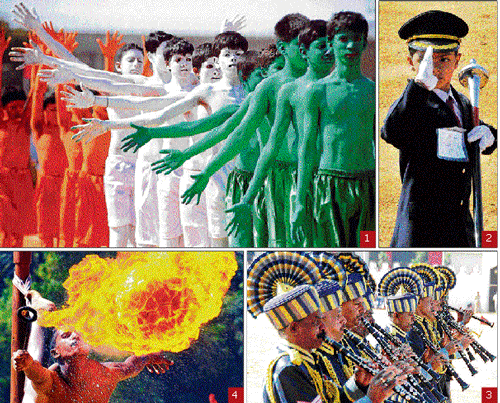 hues of patriotism: Students of the Government High School, Bagalagunte, present "Naavellaru Onde," a dance feature as part of the Republic Day celebrations at the Field Marshal Manekshaw Parade Ground in Bangalore on Sunday. (2) A school boy salutes during a march past. (3) The Police Band at its best. (4) A member of the Maratha Light Infantry Regiment,  Belgaum, performs a stunt on the 'Mallakamba.' dh Photos
