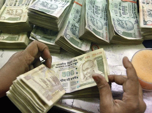 Rupee falls 18 paise against dollar in early trade. PTI file image