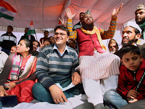 MLA Vinod Kumar Binny along with his supporters begins his fast in New Delhi on Monday. PTI Photo