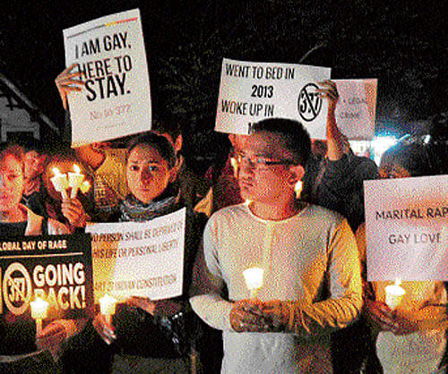 Members of the LGBT community stage a candlelight vigil in the City on Tuesday, against the Supreme Court declining to review its verdict on gay sex. DH PHOTO
