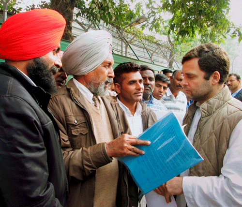 Congress Vice President Rahul Gandhi interacts with delegation of Denotified and Nomadic Tribes in New Delhi, on Wednesday. PTI Photo