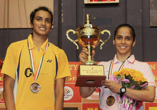 Olympic bronze medallist Saina Nehwal jumped two places to No.7 in the latest Badminton World Federation women's singles rankings and P.V. Sindhu entered the top-10 for the second time in her career. PTI Image