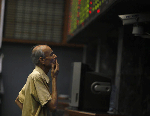 The Sensex today slipped 149 points to a two-month low on fears of capital outflows from emerging markets after the US Federal Reserve further cut its stimulus, extending the decline from a record close for the fifth day. Reuters File Photo