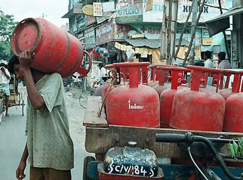 Along with the government decision to raise to 12 the cap on annual availability of subsidised LPG cylinders, the Cabinet Committee on Political Affairs Thursday decided to suspend the direct benefit transfer for LPG (DBTL) scheme till a committee conducts a review of its implementation. PTI File Photo