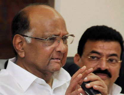 NCP President and Union Agriculture Minister Sharad Pawar interact with media at Vidhan Bhavan in South Mumbai on Friday. PTI Photo