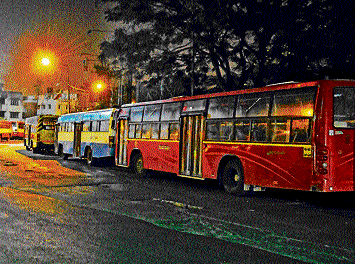 A view of buses outside Majestic Bus Stand at night. DH photo
