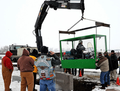 The family of Billy Standley, of Mechanicsburg, Ohio, carried out his wish to be buried on his 1967 Harley Davidson motorcycle Friday, Jan. 31, 2014, burying him in a large Plexiglas casket at Fairview Cemetery in Crawford County, Ohio. Standley's family said he'd been talking about being buried on his Harley for years. His sons, Pete and Roy, fashioned the casket out of Plexiglas, reinforcing the bottom with wood and steel rods to handle the extra weight. Five embalmers worked to prepare Standley's body with a metal back brace and straps to ensure he'll never lose his seat. AP photo