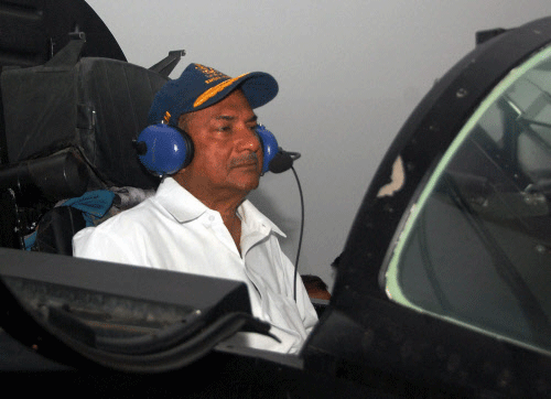 File photo of Defence Minister AK Antony sitting in the cockpit of a MiG-29 K fighter plane that was commissioned into Navy at a function held at the Naval Base INS Hansa in Goa. PTI
