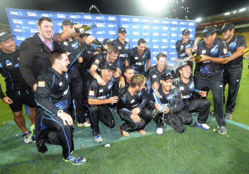 New Zealand cricket players celebrate their series' victory over India during the fifth one day International cricket match at Westpac Stadium in Wellington, New Zealand, Friday, Jan. 31, 2014. AP photo