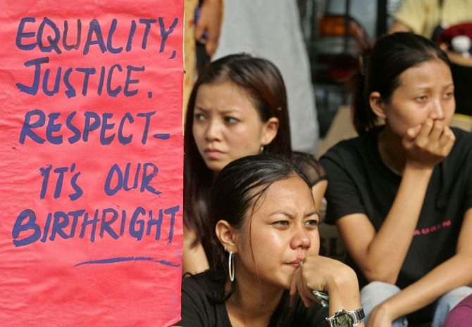 Students from North East Students Joint Action Committee hold a placard during a protest in New Delhi. File photo. Reuters
