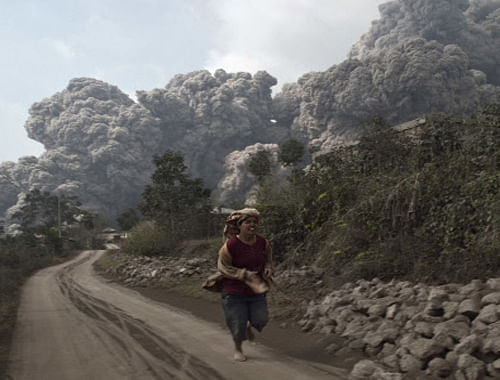 Eight people were killed and three others injured after being hit by hot ash spewed by Mount Sinabung volcano in North Sumatra on Saturday, an official said. Reuters Photo