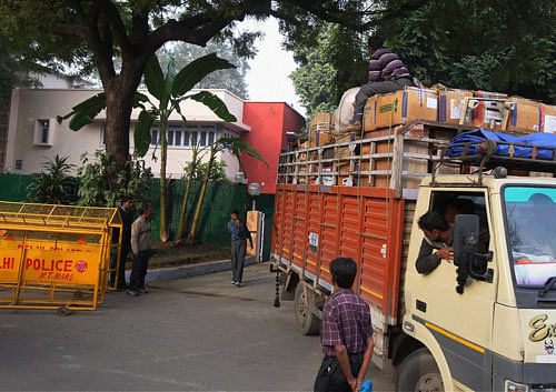 A truck containing luggage at the new residence of Delhi Chief Minister Arvind Kejriwal at Tilak lane, in Central Delhi on Saturday. PTI Photo