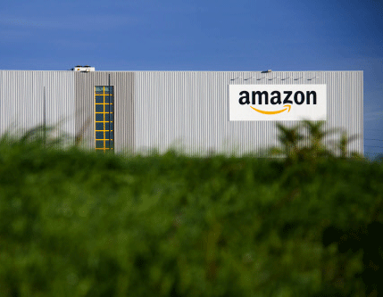 This Sept.19, 2013 photo shows the new logistics center of online merchant Amazon in Lauwin-Planque, northern France. In an unusual show of unity, the French Senate unanimously approved early Thursday, Jan. 9, 2014 a bill to help struggling independent book shops facing pressure from online competitors that offer lower prices. France's lower house of parliament approved the bill last fall. AP photo