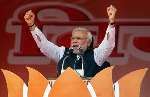 BJP Prime Ministerial Candidate Narendra Modi addressing Vijay Shankhnaad rally in Meerut on Sunday. PTI Photo