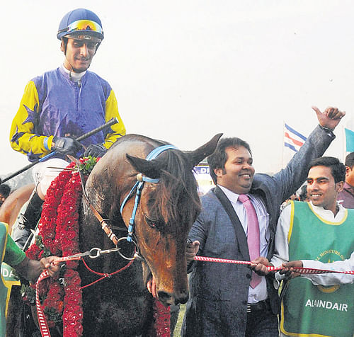 Alandair (Srinath up) is led in after  winning the Indian Derby on Sunday. PTI Photo