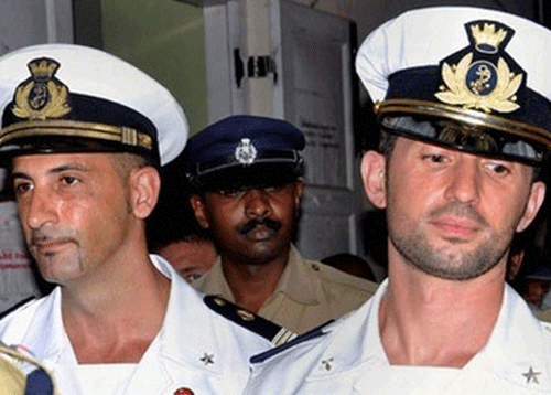 file photo of two Italian marines accused of killing two Indian fishermen off Kerala coast in 2012. PTI