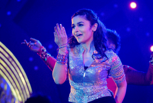 Bollywood actor Alia Bhatt performs at Saifai Mahotsav in Etawah district on Wednesday night. PTI Photo