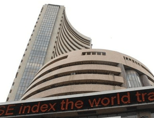 Key benchmark indices edged lower on the first trading session of the week and the month after the government revised downwards the GDP growth rate for the year ended 31 March 2013 (2012-13) to 4.5 per cent from 5 per cent reported earlier. PTI File Photo