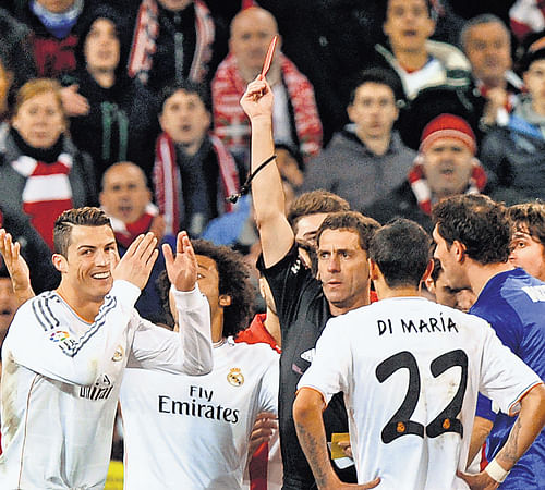 Cristiano Ronaldo is aghast as referee flashes the red, packing off the star striker. Reuters Photo
