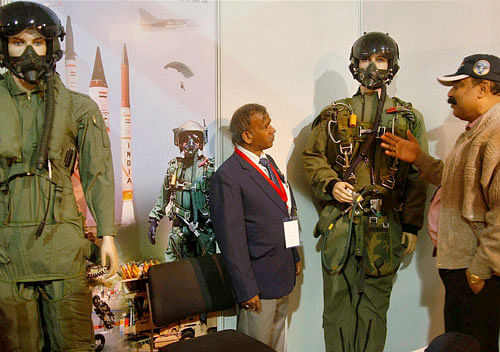 A delegate at the DRDO stall during the 101st Indian Science  Congress in Jammu on Monday. PTI