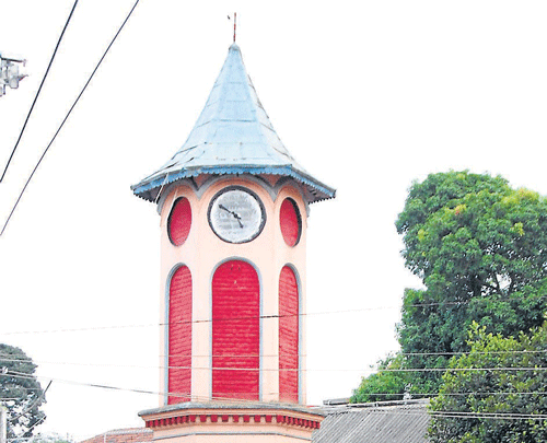 The 100-year-old clock tower in Virajpet town. DH Photo