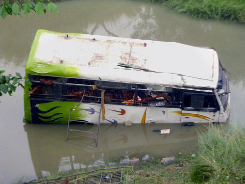 Ten tourists from Porbander in Gujarat died and 35 others injured late on Monday when a luxury bus in which they were travelling fell into a deep ditch on the ravines of the Khambatki Ghat along the Pune-Solapur highway.  PTI File Photo. For Representation Only.