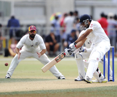 India's Rohit Sharma bats against New Zealand XI on the second day of a pre test warm up cricket match at Cobham Oval in Whangarei, New Zealand, Monday, Feb. 3, 2014. AP photo