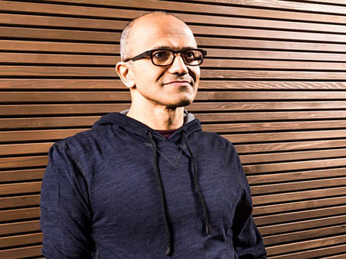 Cricket-loving Satya Nadella will get a base annual salary of USD 1.2 million as new CEO of Microsoft, but his overall package after taking into account bonus and stock awards may reach USD 18 million (Rs 112 crore) a year besides various other perks. Reuters Photo