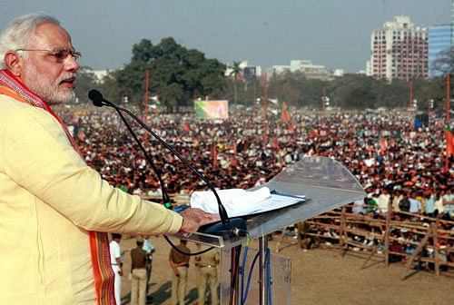BJP'S Prime Ministerial candidate Narendra Modi addressing a rally in Kolkata on Wednesday. PTI Photo