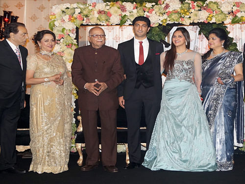 Senior BJP leader LK Advani, actor Dharmendra, actress Hema Malini with Ahana Deol and Vaibhav at their wedding reception in New Delhi on Wednesday. PTI Photo