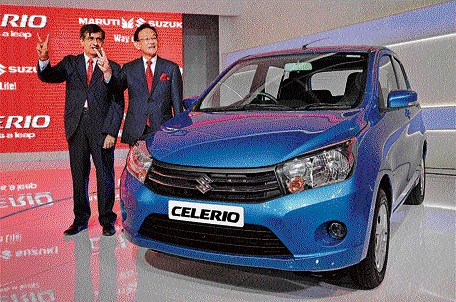 Maruti Suzuki COO Mayank Pareek (left) unveiled the Celerio at Auto Expo 2014 in Greater Noida on Thursday. PTI