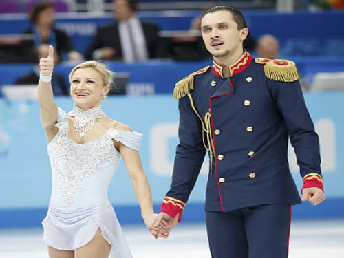 Reigning World champions Tatiana Volosozhar/Maxim Trankov and Turin Olympic gold medallist Evgeni Plushenko gave hosts Russia the lead in the figure skating team event after the pairs and men's short programmes here. Reuters Photo