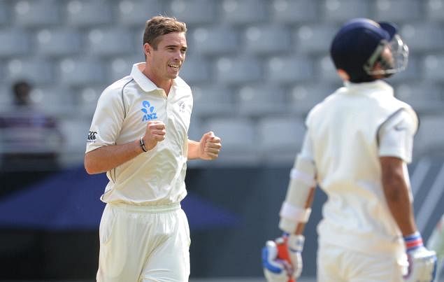 New Zealand's Tim Southee dismisses India's Ajinkya Rahane for 26, on the 3rd day of the 1st cricket Test in Eden Park, Auckland, New Zealand on Saturday.