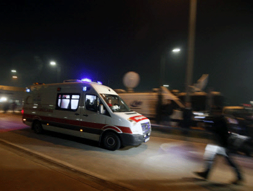 An ambulance leaves Sabiha Gokcen Airport in Istanbul late February 7, 2014. Turkish security forces seized a Ukrainian man who made a bomb threat and tried to hijack a passenger plane, demanding to go to the Winter Olympics venue of Sochi, a Transport Ministry official told Reuters on Friday. Earlier Turkey had scrambled an F-16 fighter jet to accompany the Pegasus Airlines Boeing 737-800 plane with 110 passengers on board as it landed at Istanbul's Sabiha Gokcen airport after a flight from the Ukrainian city of Kharkov. REUTERS